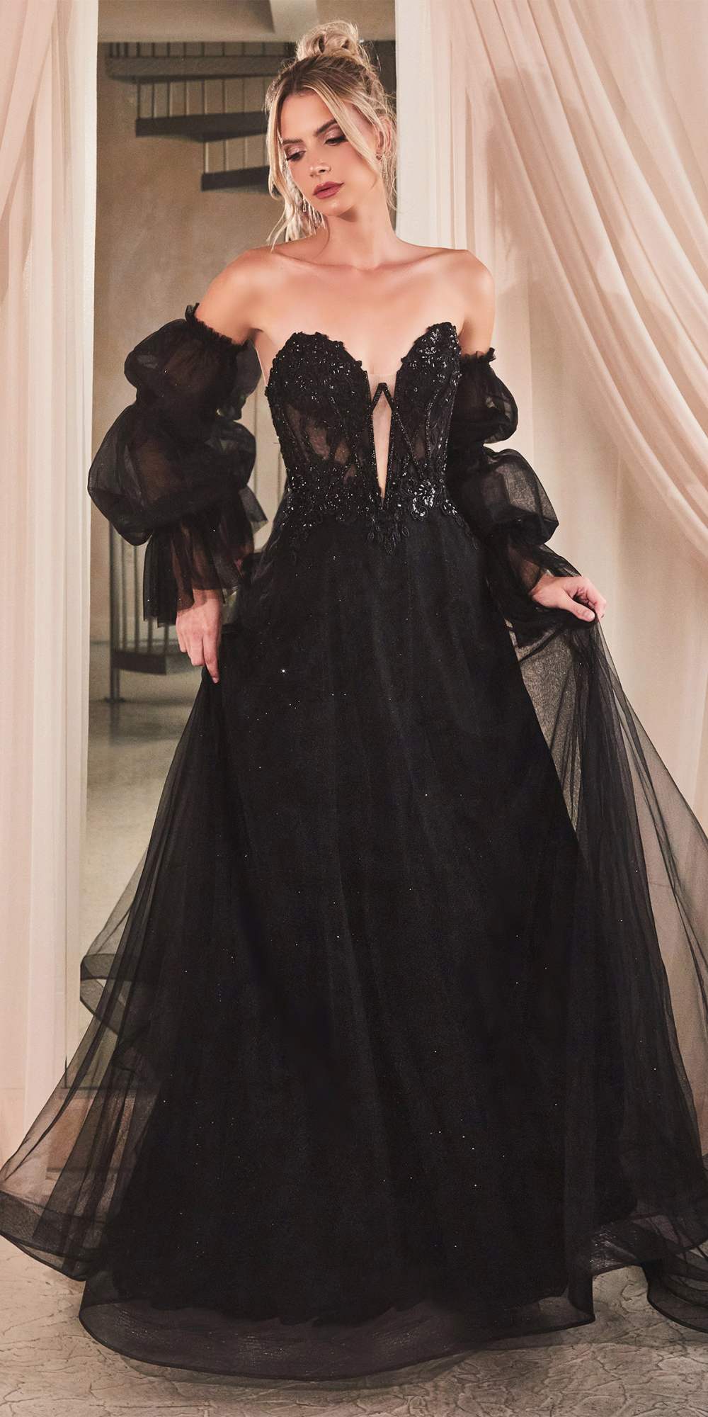 Black long strapless ball gown with removable sheer sleeves and full tulle skirt