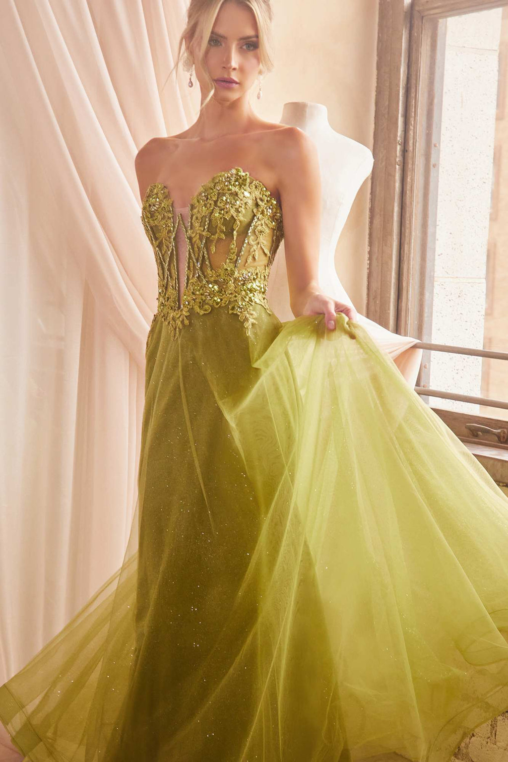 Lemon yellow strapless ball gown with embellished bodice and full flowing tulle skirt