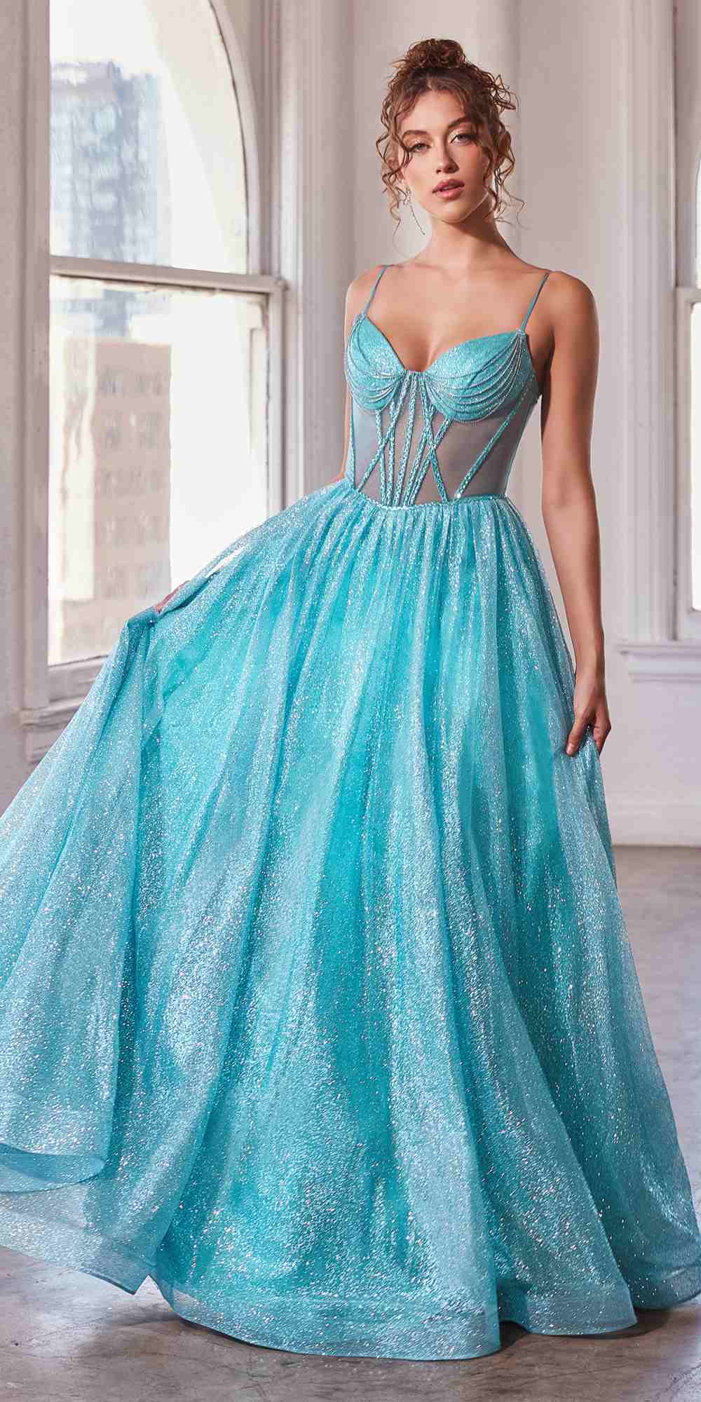 Aqua glitter ball gown with corset-style spaghetti straps and full flared skirt