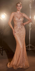 Rose gold rhinestone tulle gown with spaghetti straps and mermaid silhouette