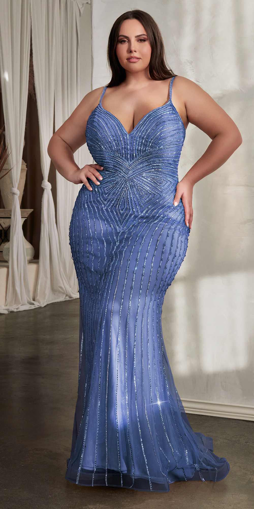 Blue rhinestone tulle mermaid gown with sweetheart neckline and fitted waist