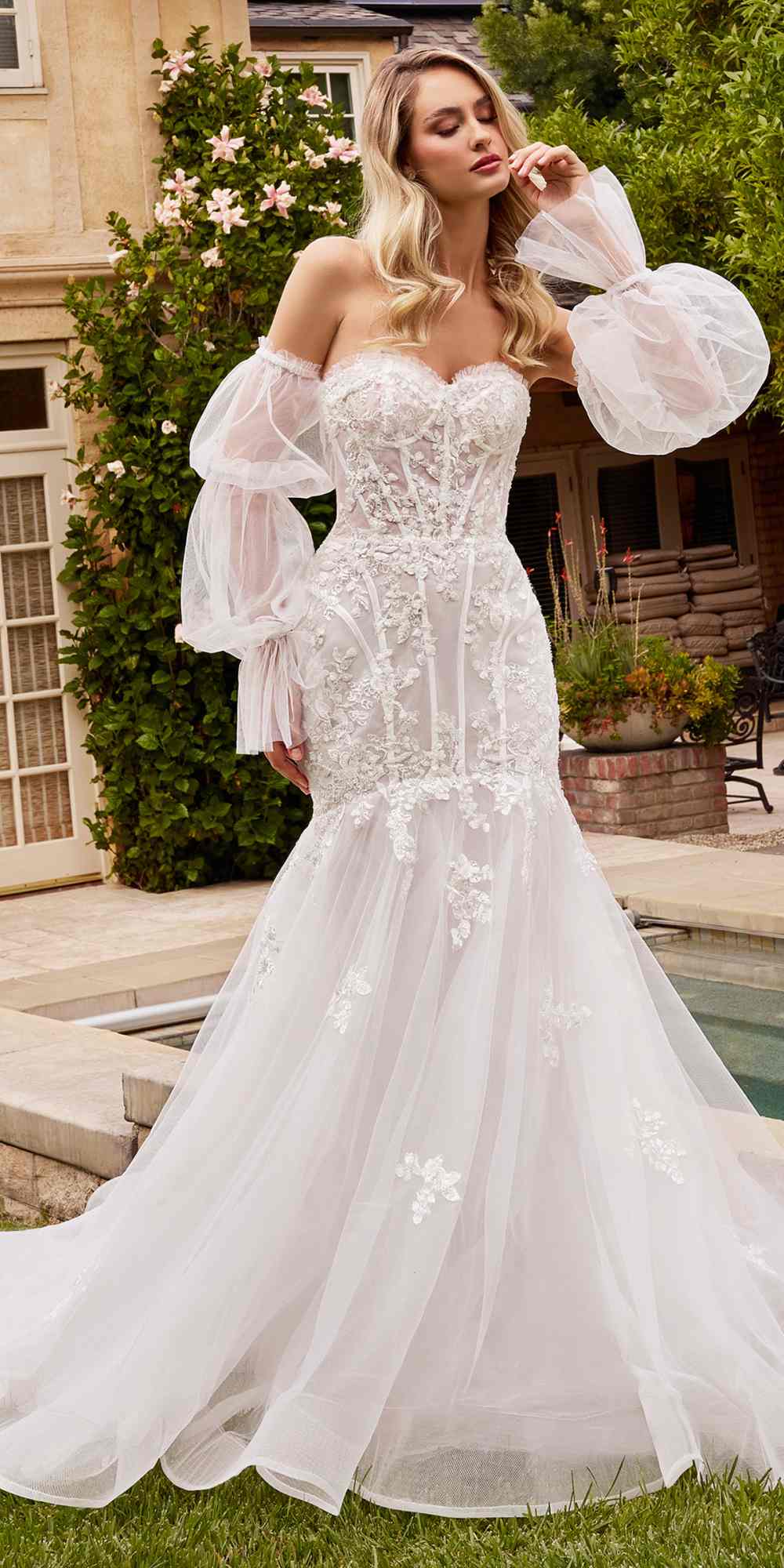 Off-white long strapless mermaid dress with lace bodice and sheer puff sleeves
