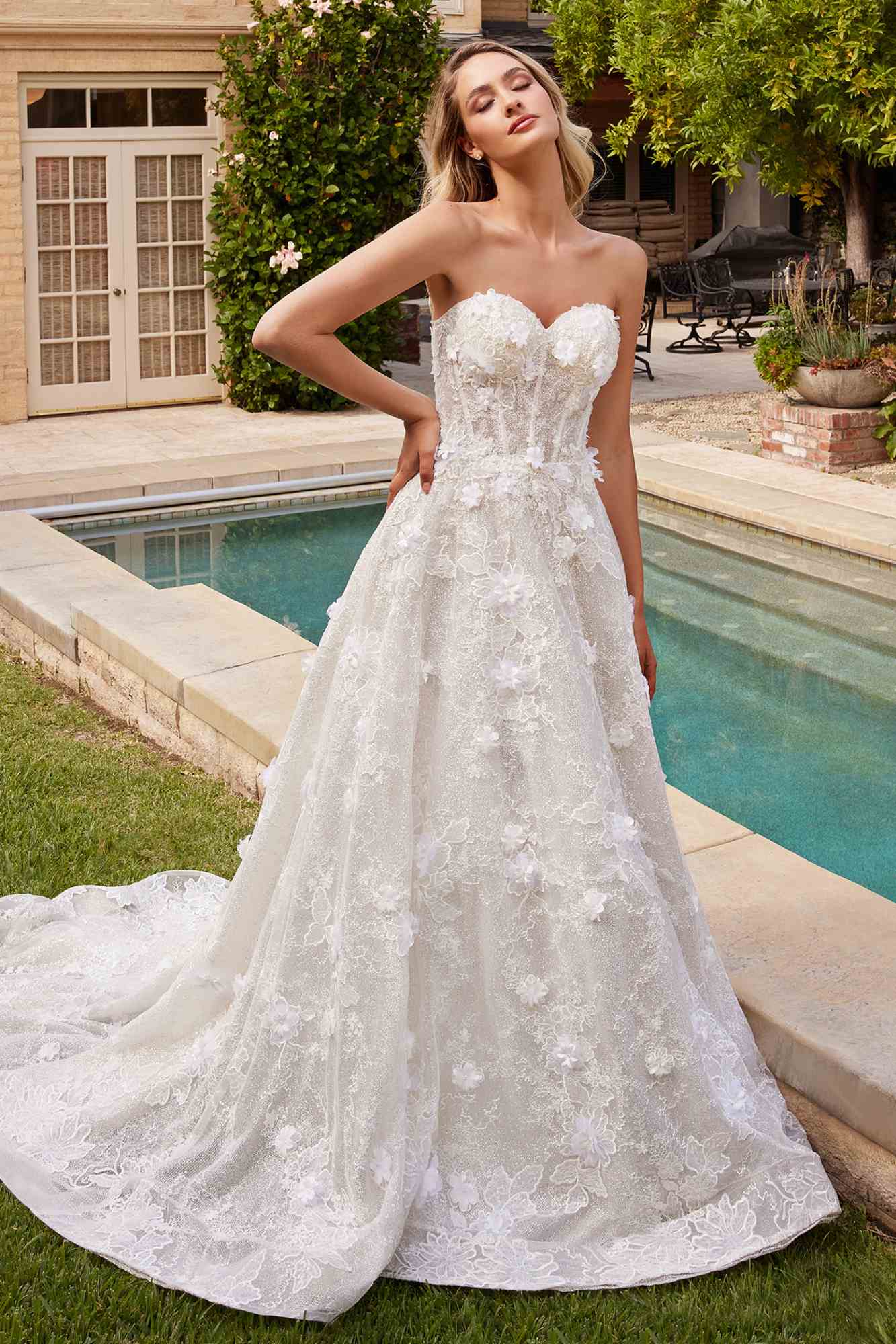 Off-white lace strapless A-line bridal gown with sweetheart neckline and long train