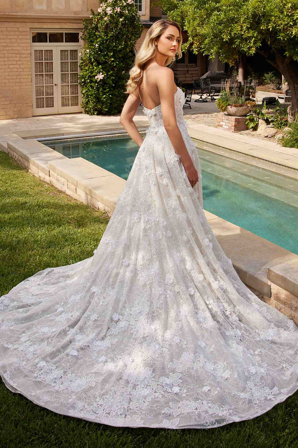 Off-white lace strapless A-line bridal gown with long chapel train, full skirt