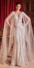 Platinum embellished formal gown with cape sleeves and long sheer tulle overlay