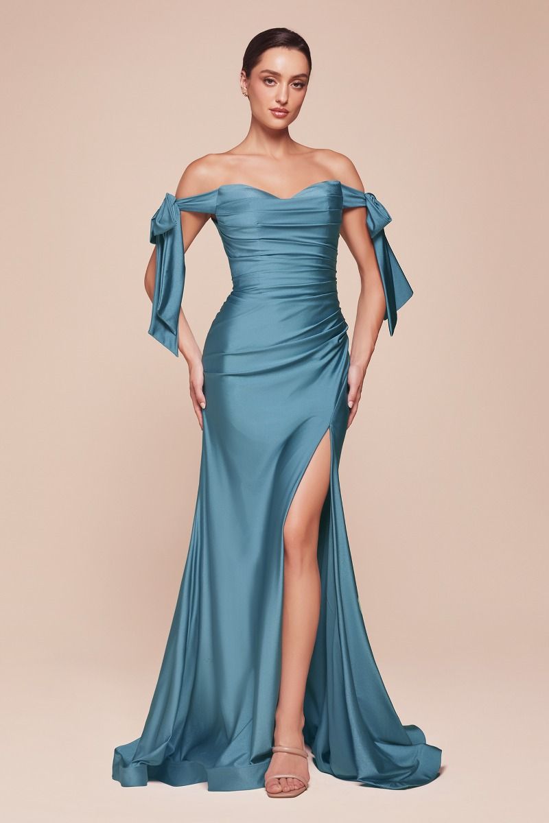 Off-shoulder fitted jersey formal dress in teal-blue with bow shoulder ties and front slit.