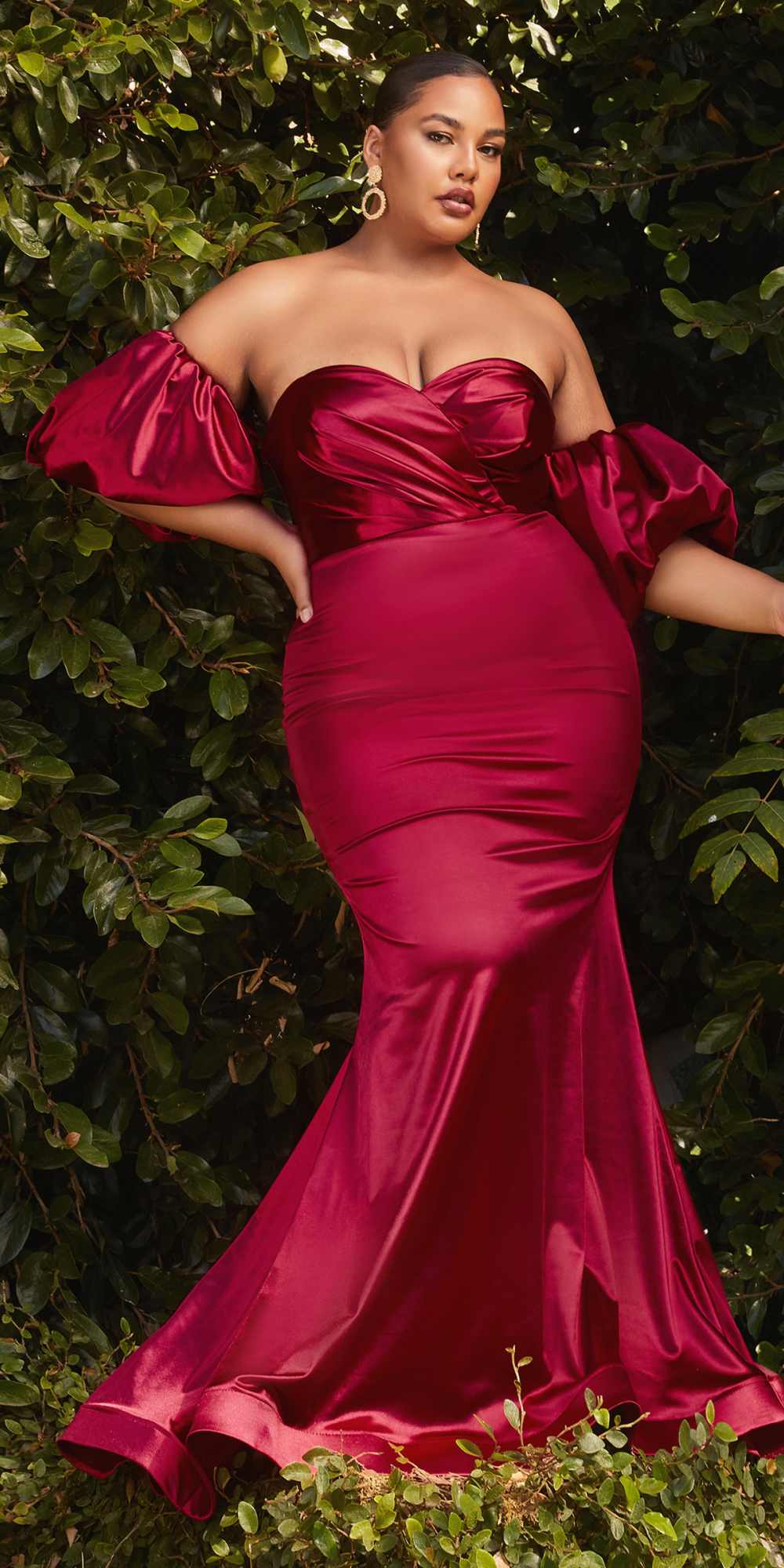 Burgundy satin fitted gown with off-shoulder neckline and puff sleeves
