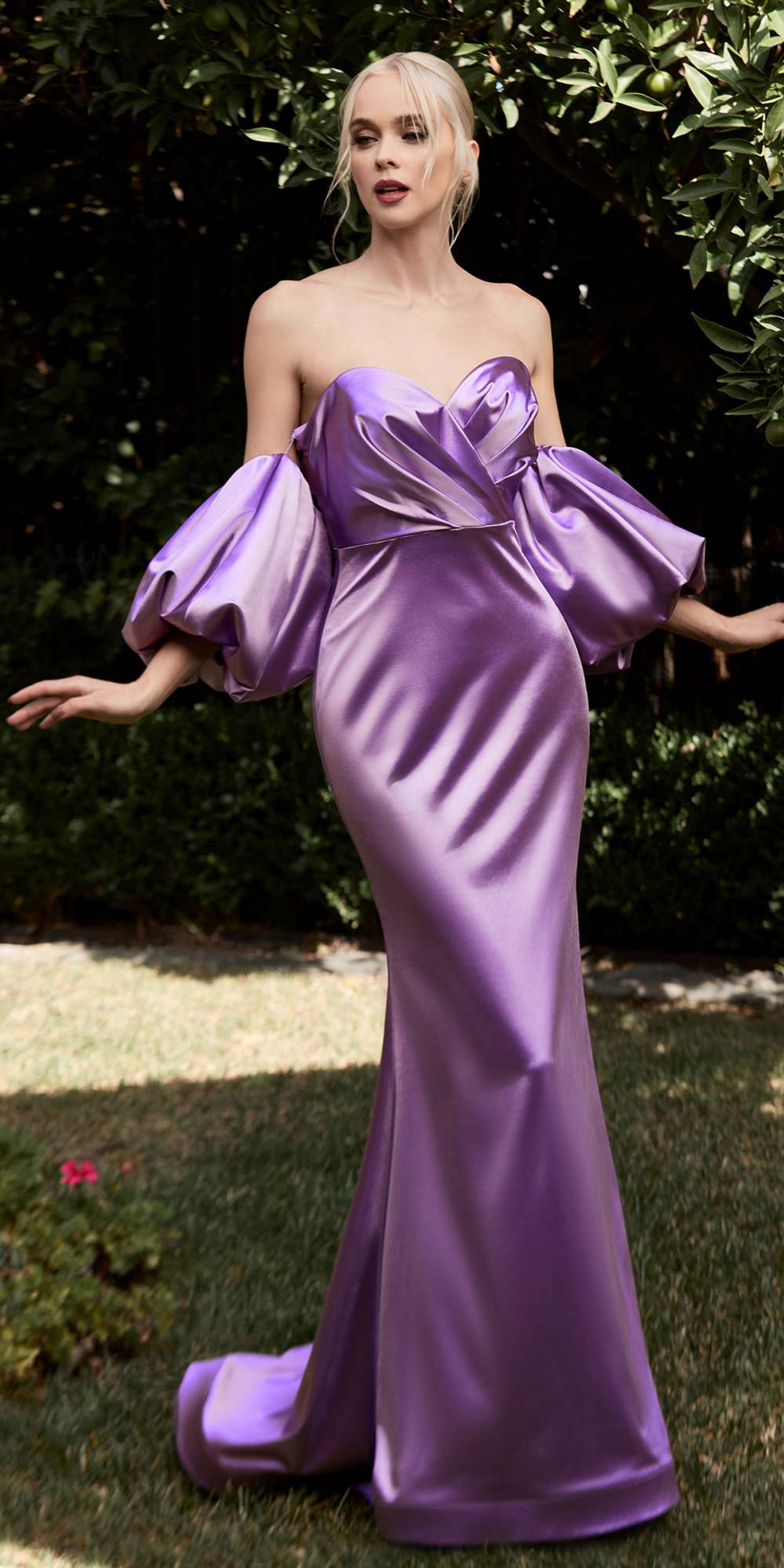 Purple satin fitted gown with off-shoulder neckline and voluminous puff sleeves
