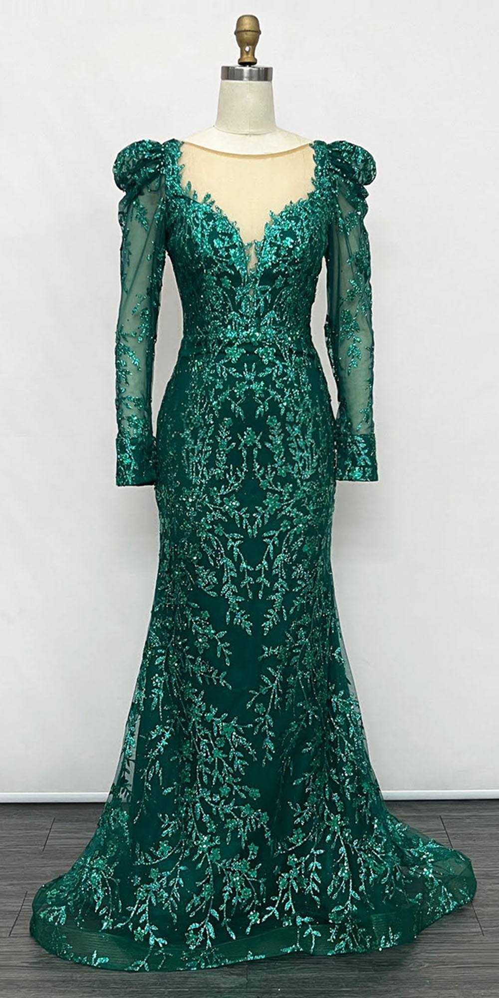 Glitter lace floor-length dress on mannequin, long sleeves, emerald green, mermaid hem