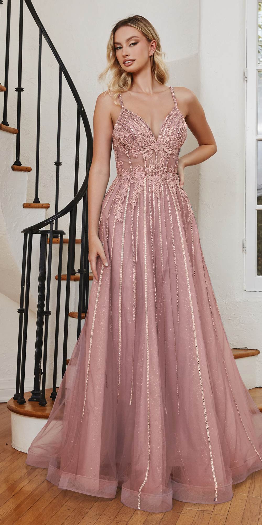 Blush pink long A-line tulle gown with beaded V-neck bodice and thin straps