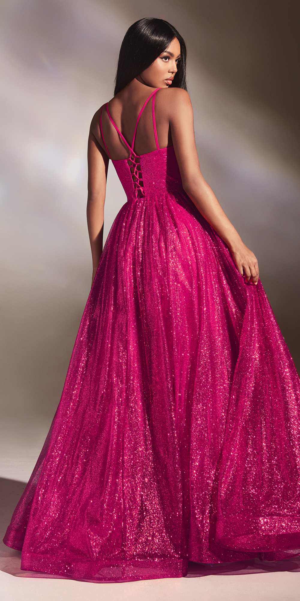 Red glitter ball gown with spaghetti straps and open back, full A-line skirt