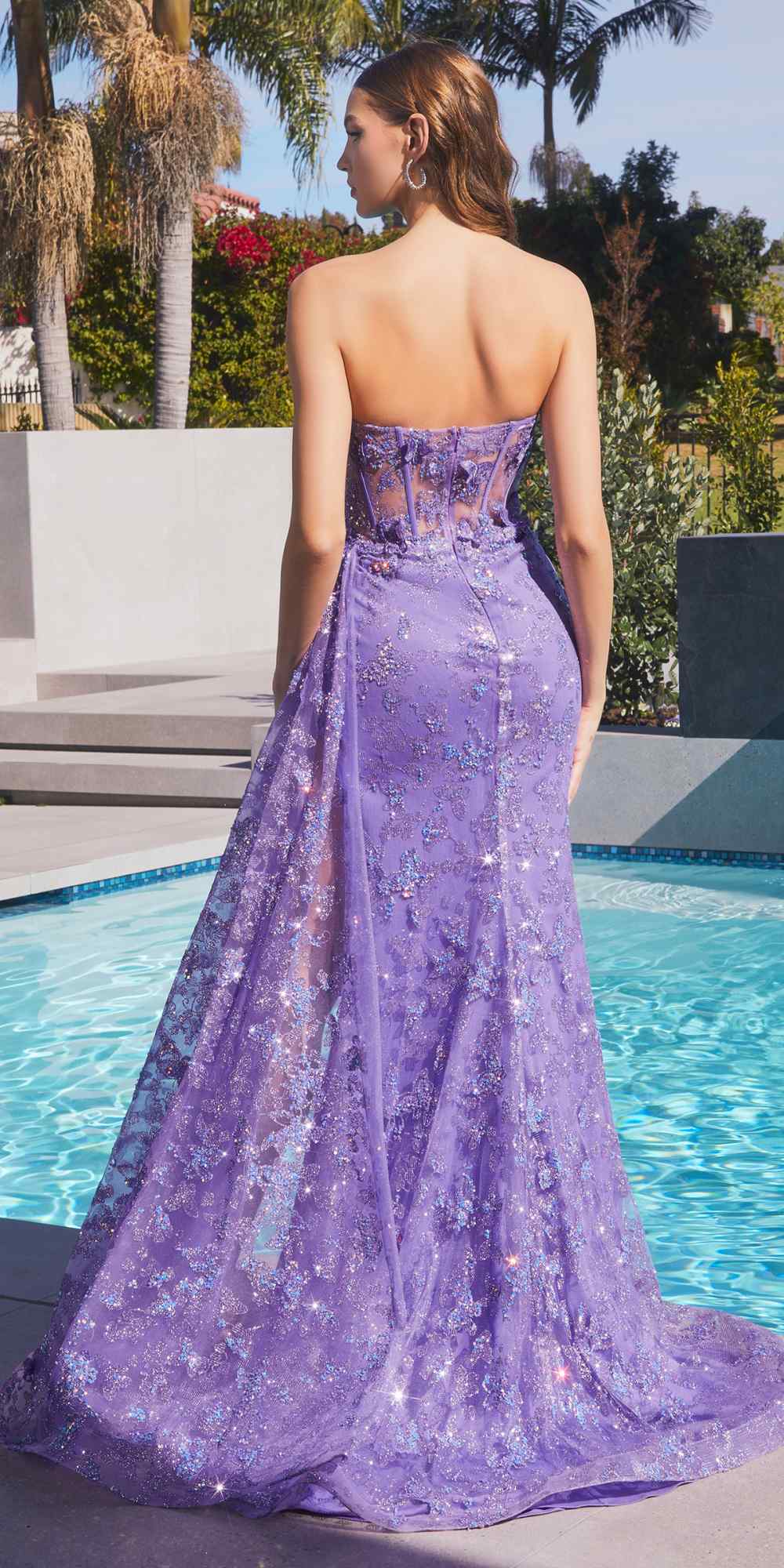 Purple strapless long gown with open back and full sparkly skirt