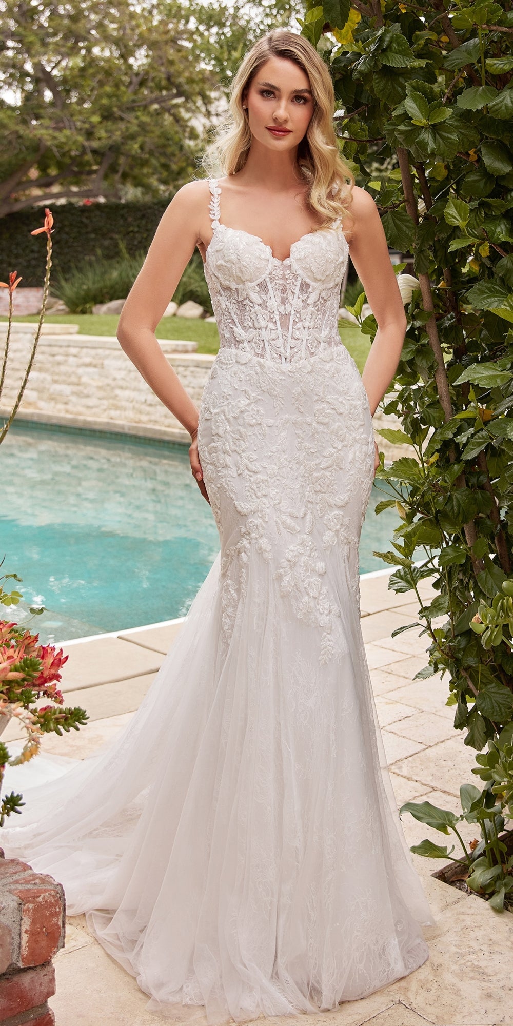 Off-white mermaid wedding gown with lace bodice, thin straps, V-neck and long tulle skirt