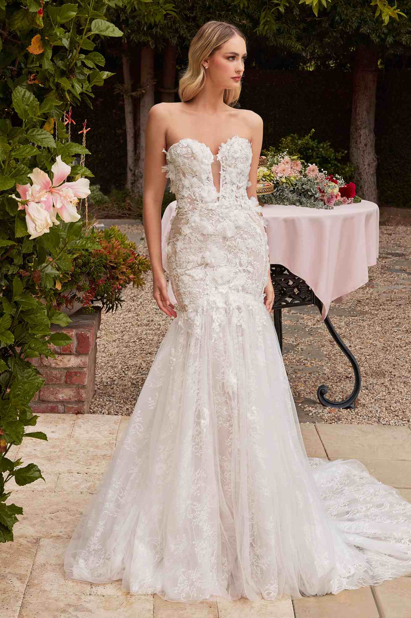 Off-white lace mermaid gown with strapless sweetheart bodice and removable puff sleeves