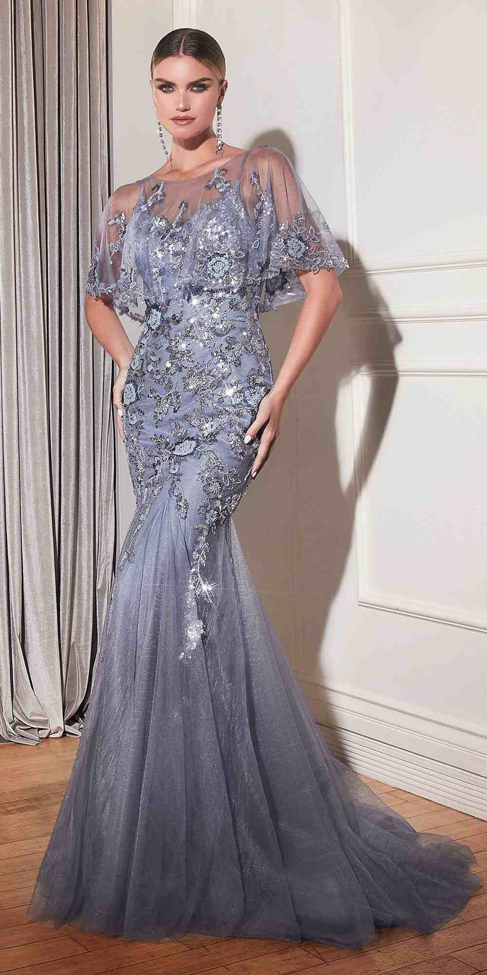 Light blue beaded mermaid gown with removable short sleeve capelet and illusion neckline