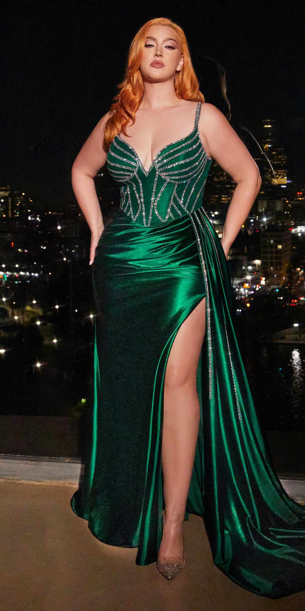 Long emerald green satin gown with embellished corset and high front slit