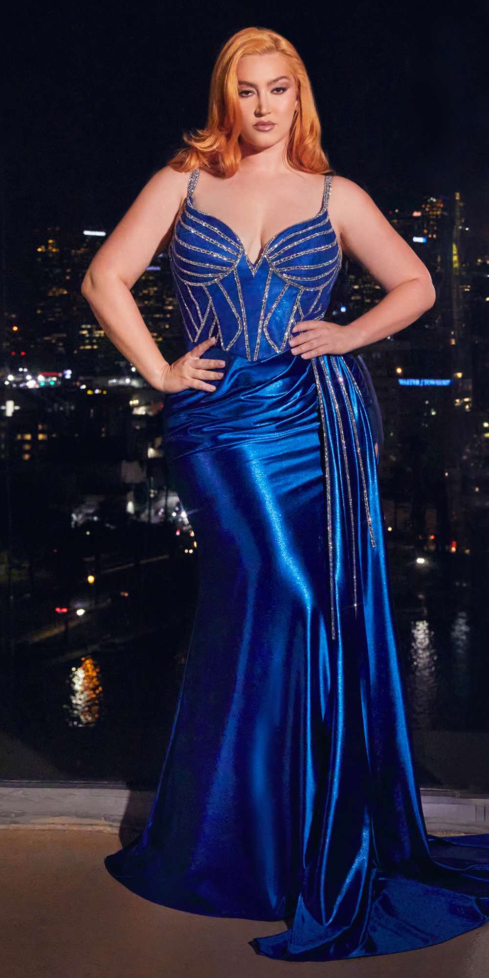 Floor-length satin gown with sheer corset bodice and rhinestone embellished blue design