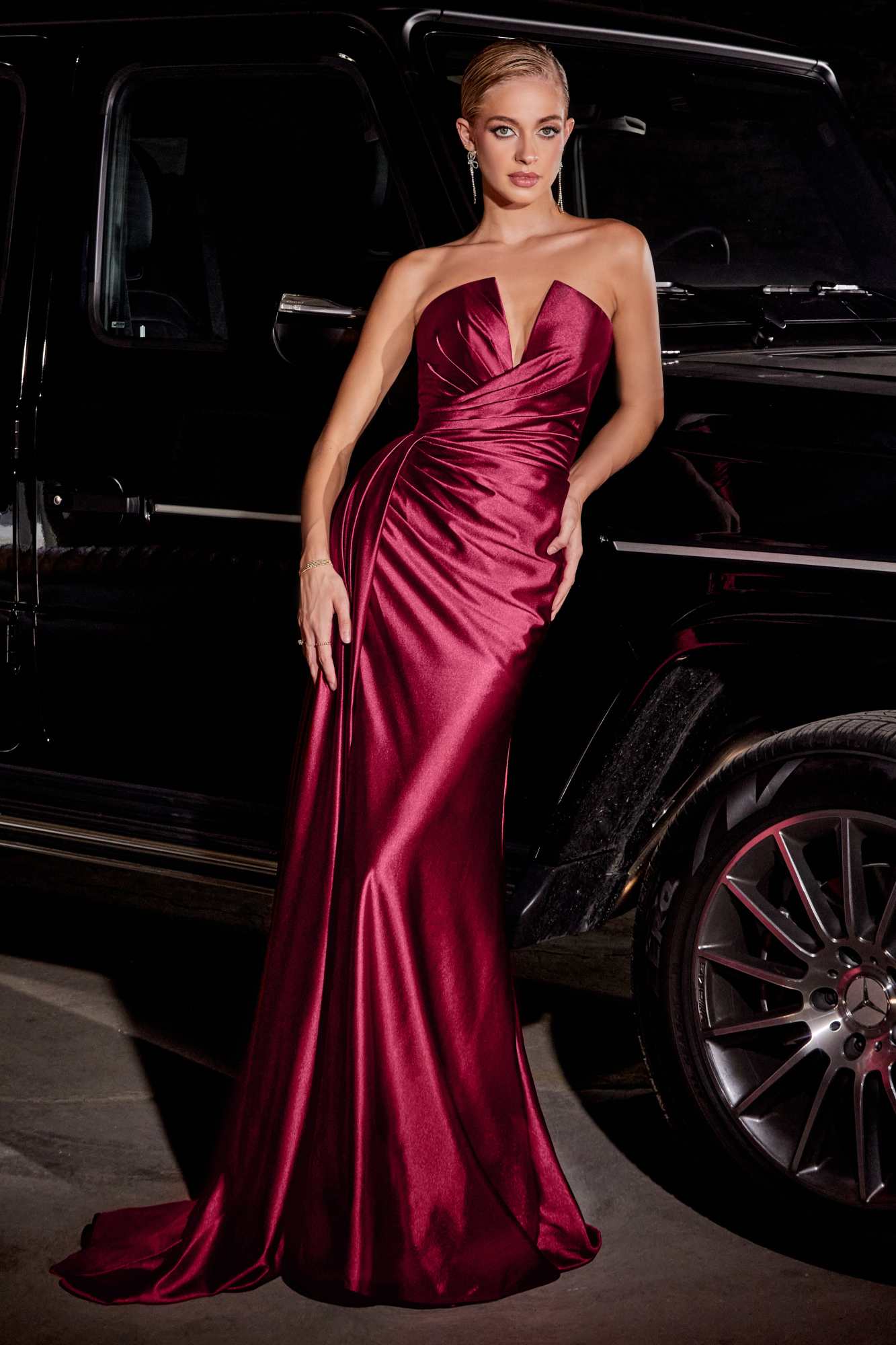 Burgundy satin sweetheart strap long gown with ruched bodice and flowing skirt