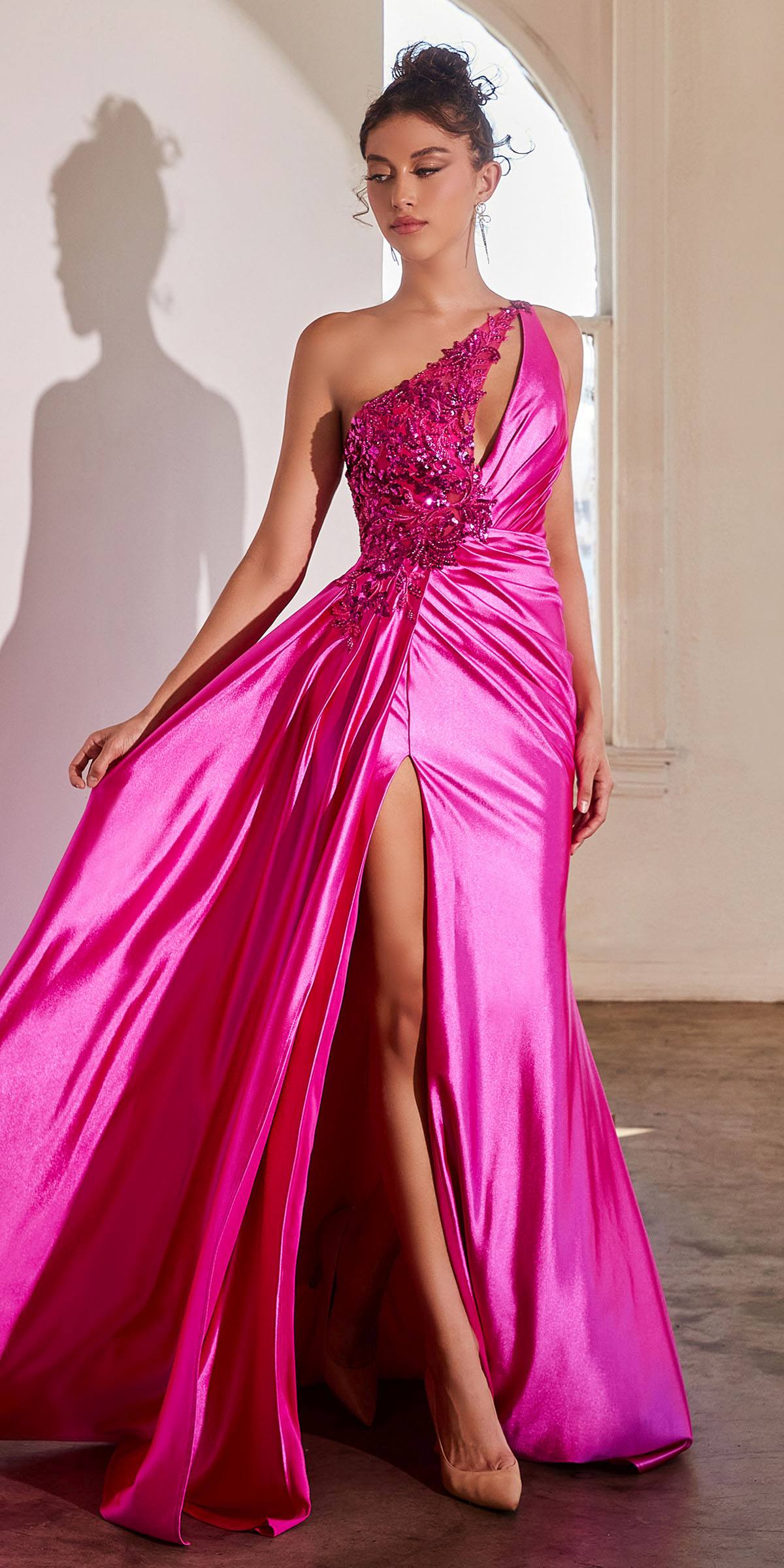 Fuchsia one-shoulder satin gown with glittery sequin bodice and high leg slit