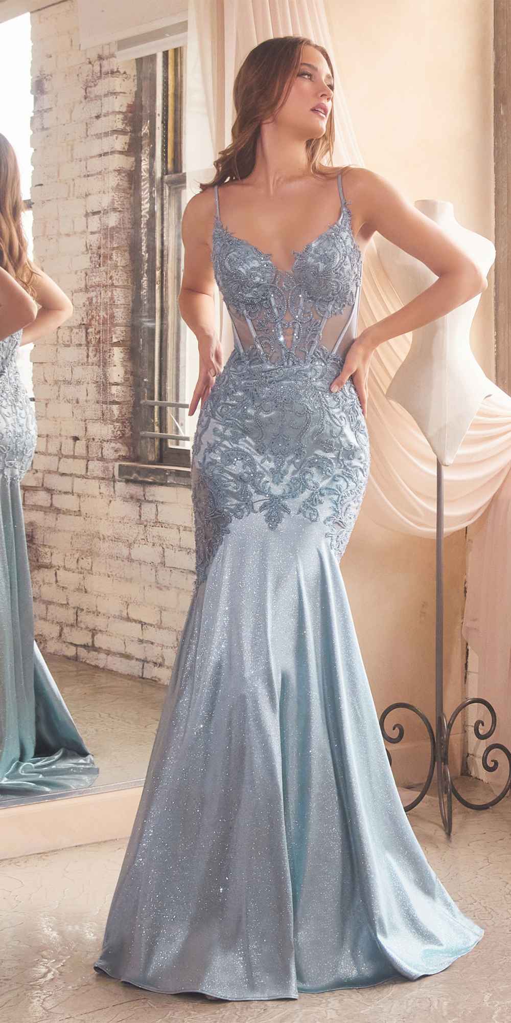 Light blue mermaid gown with glitter lace bodice and spaghetti straps, flared skirt