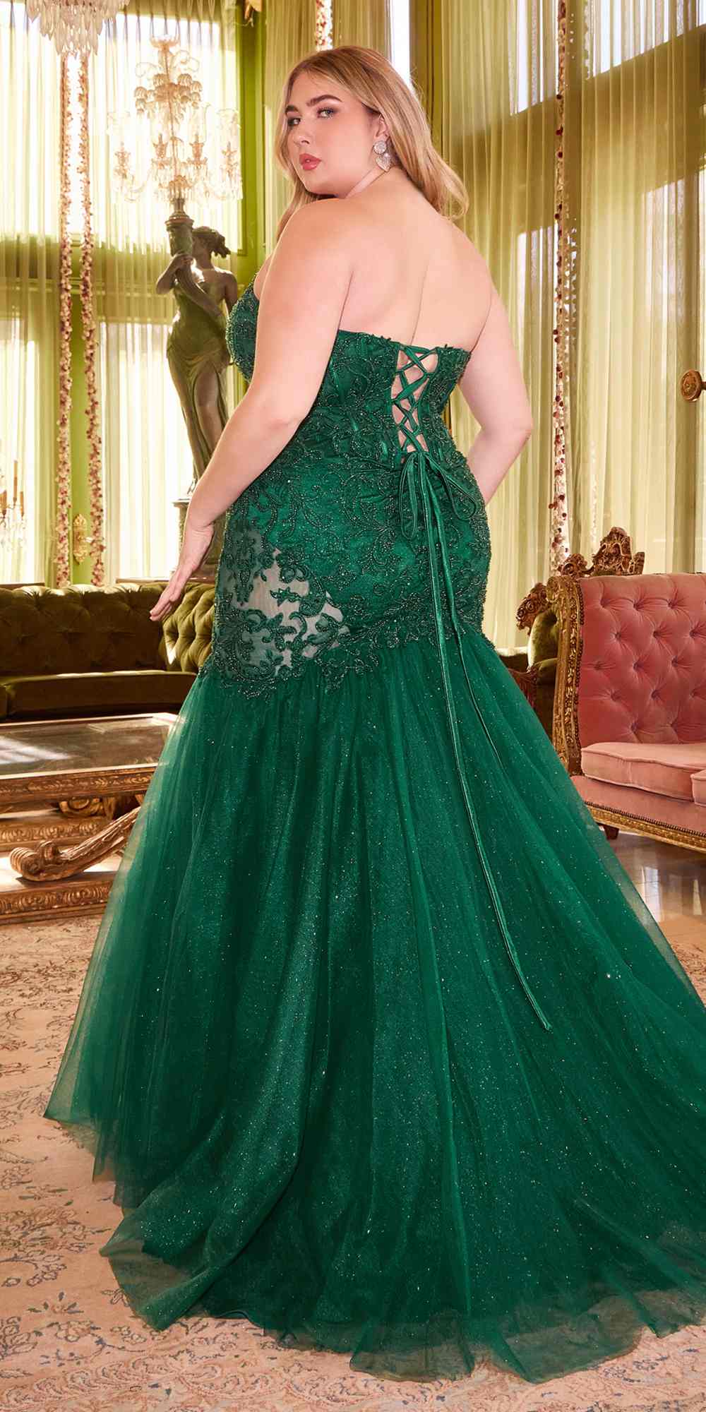 Emerald green strapless lace mermaid gown with open back and tulle skirt