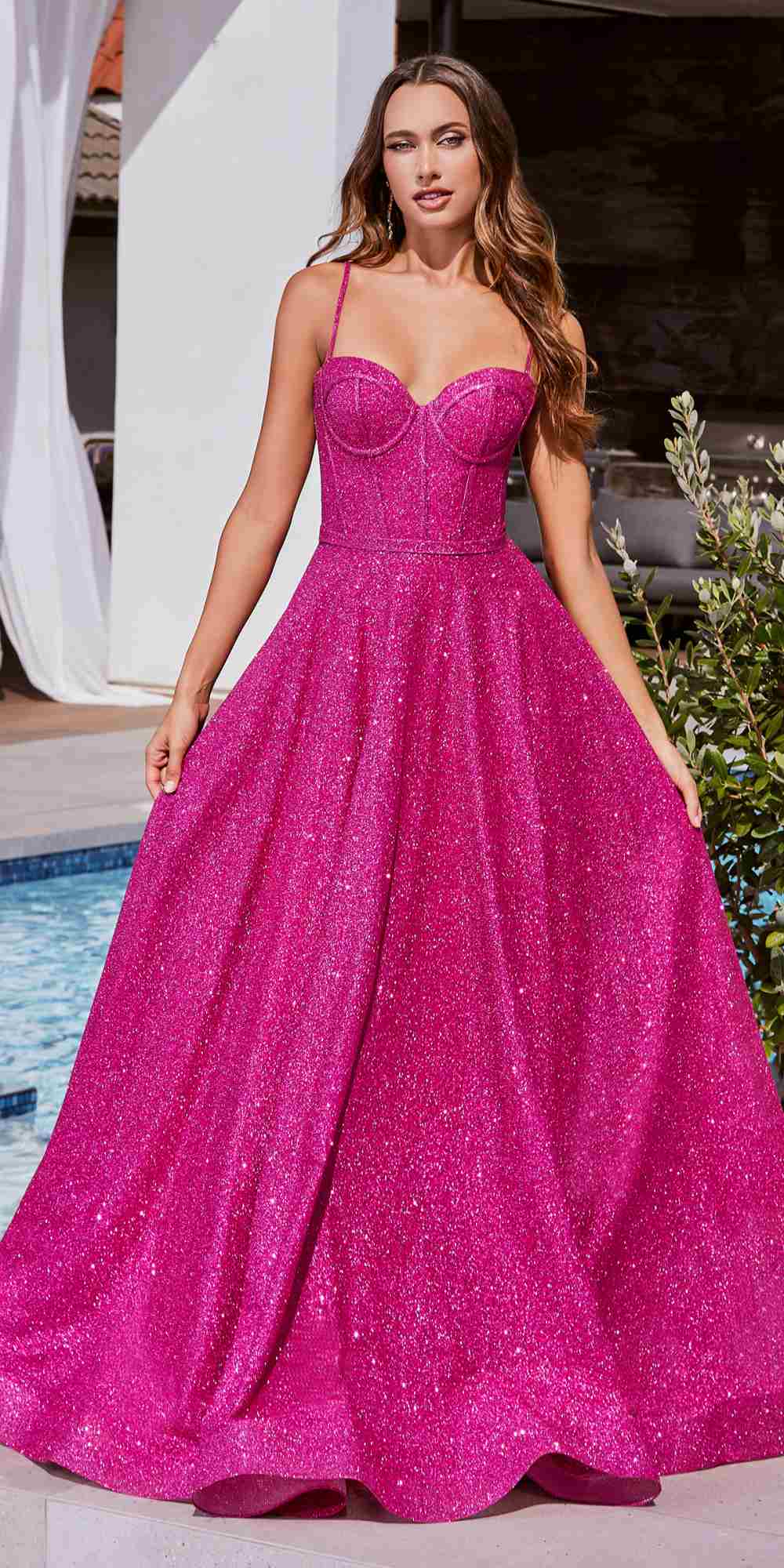 Fuchsia glitter sweetheart A-line ball gown with thin straps and flared long skirt