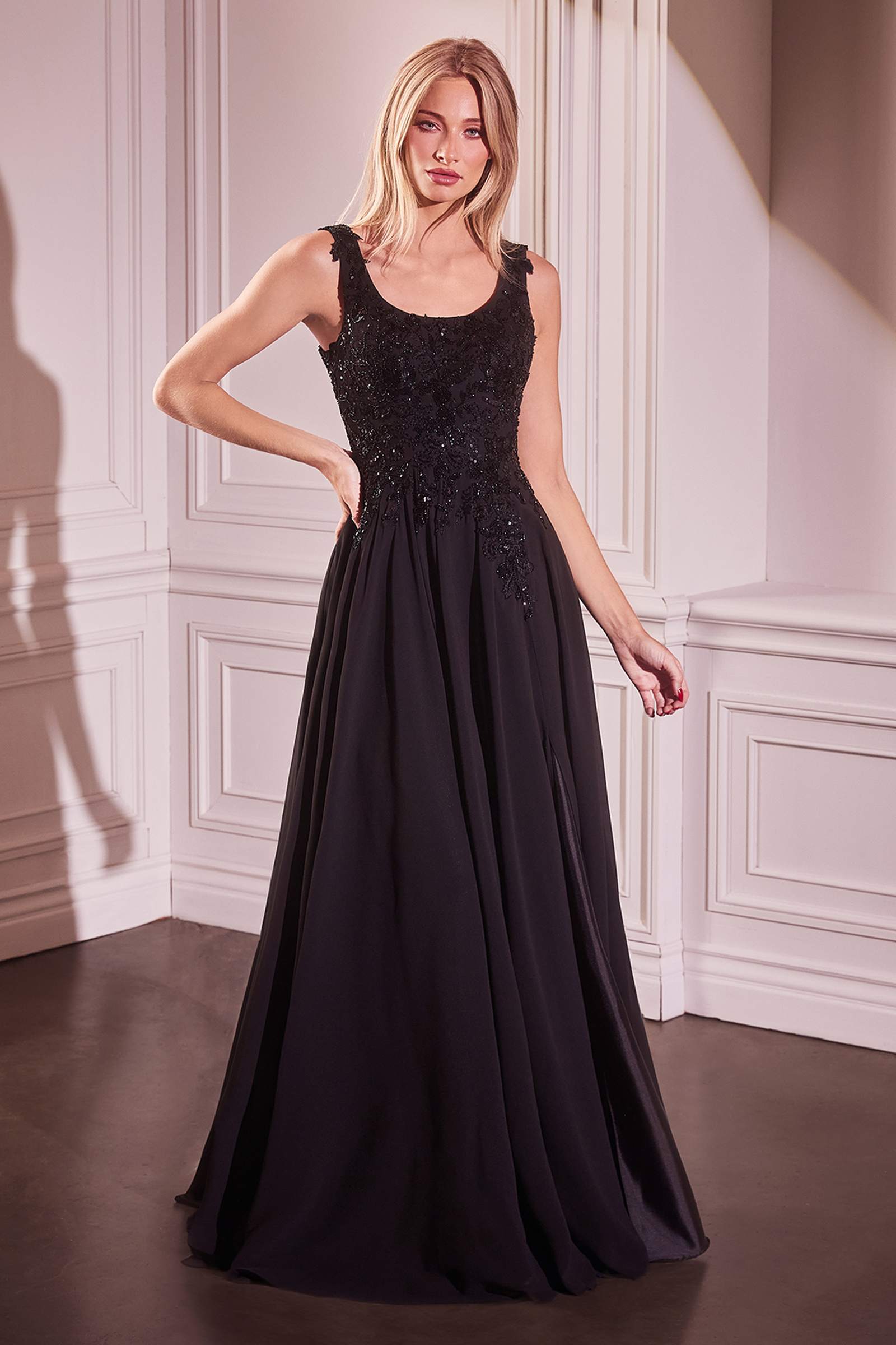 Black A-line evening dress with beaded lace bodice and sleeveless lace detail