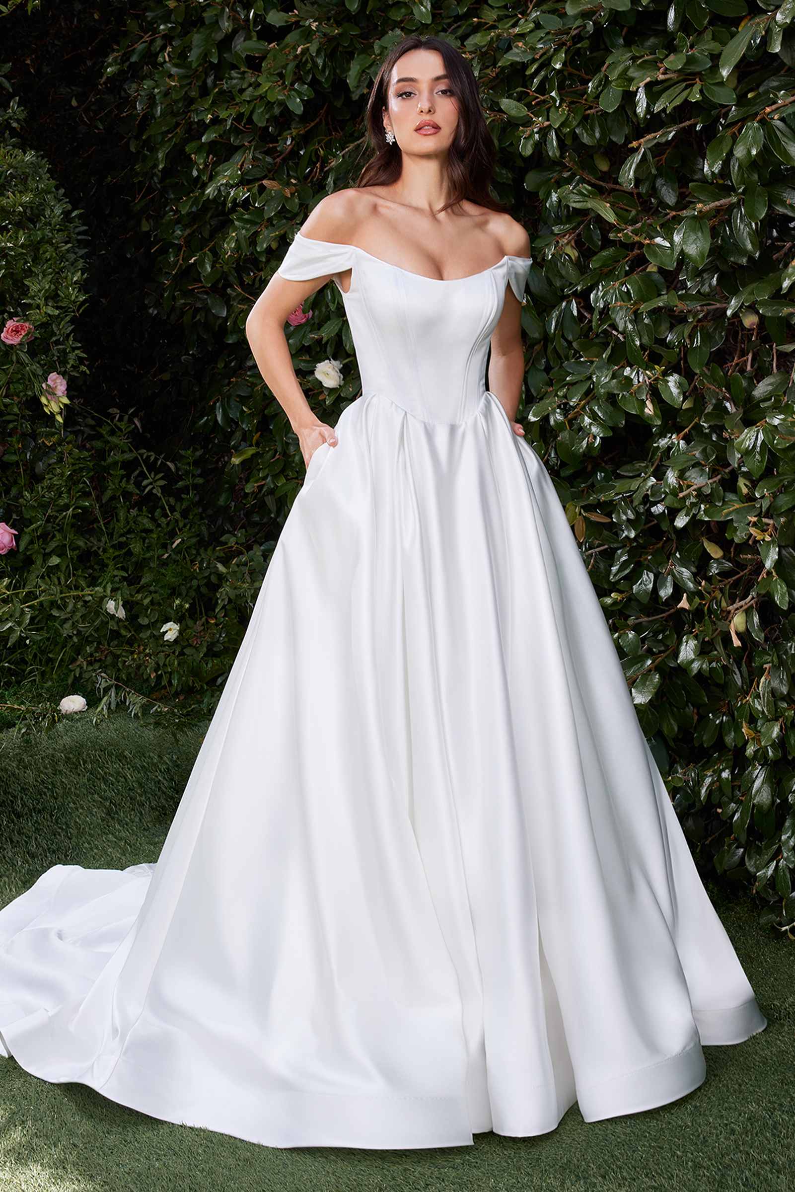 Off-shoulder off-white satin bridal gown with sweetheart bodice and full A-line skirt