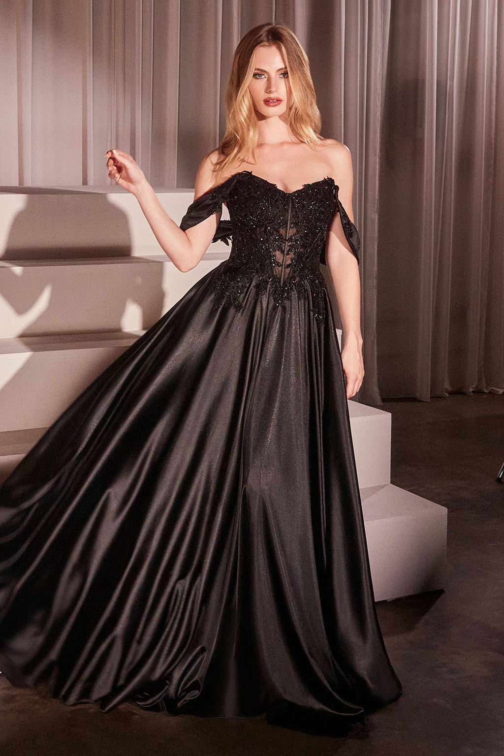 Off-shoulder lace A-line prom dress with satin skirt, black, standing side view