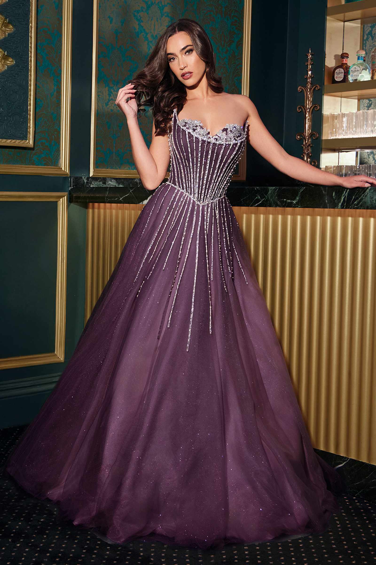 Purple strapless A-line ball gown with sparkling crystal beading and full tulle skirt