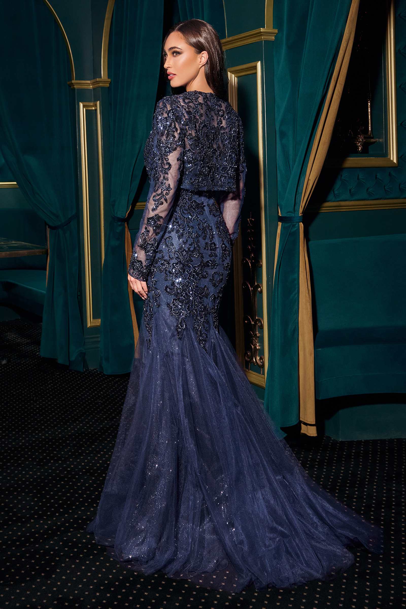 Navy strapless mermaid gown with floral sequin pattern and long back silhouette
