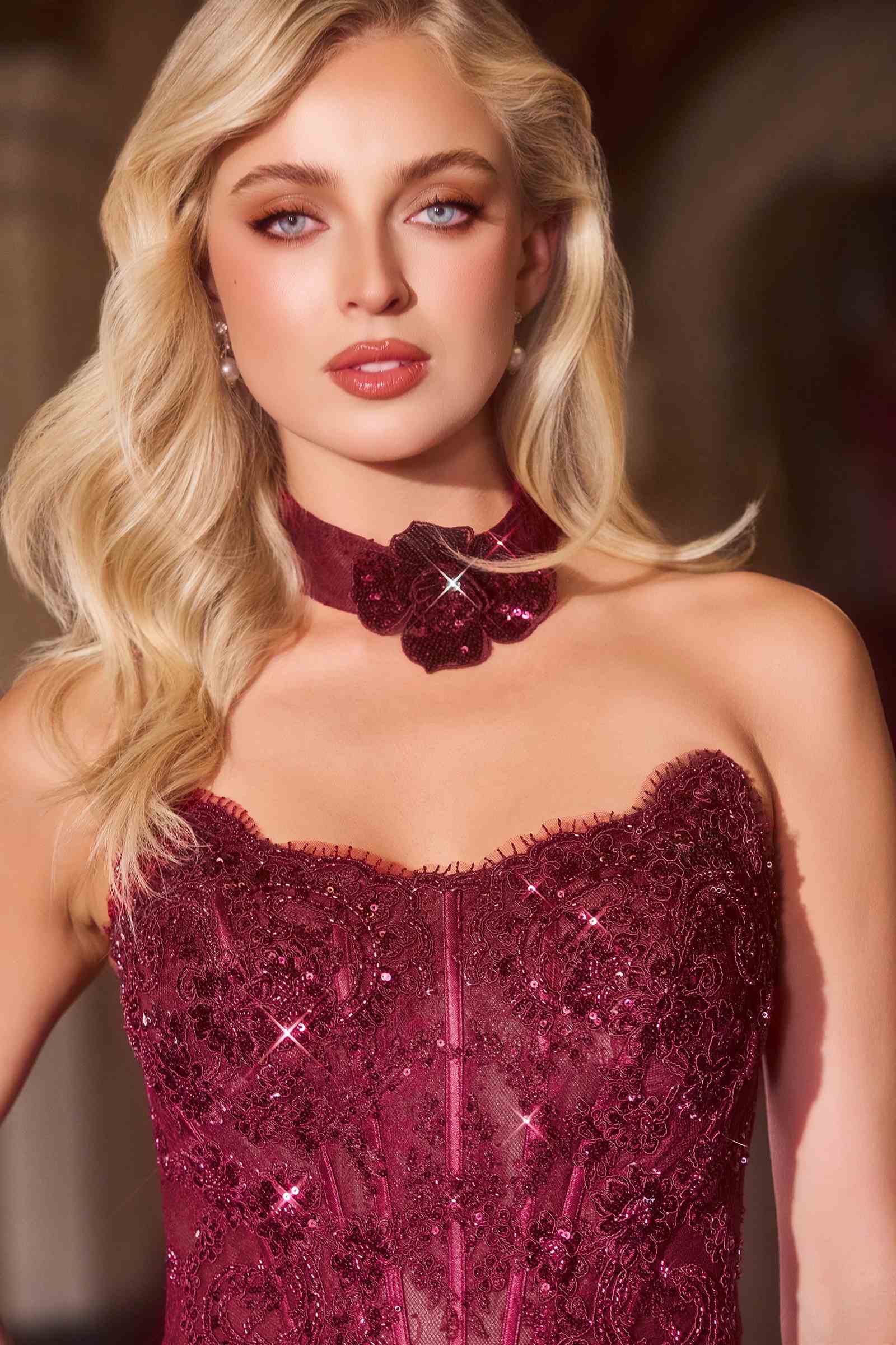 Burgundy strapless evening gown with matching choker and textured lace bodice