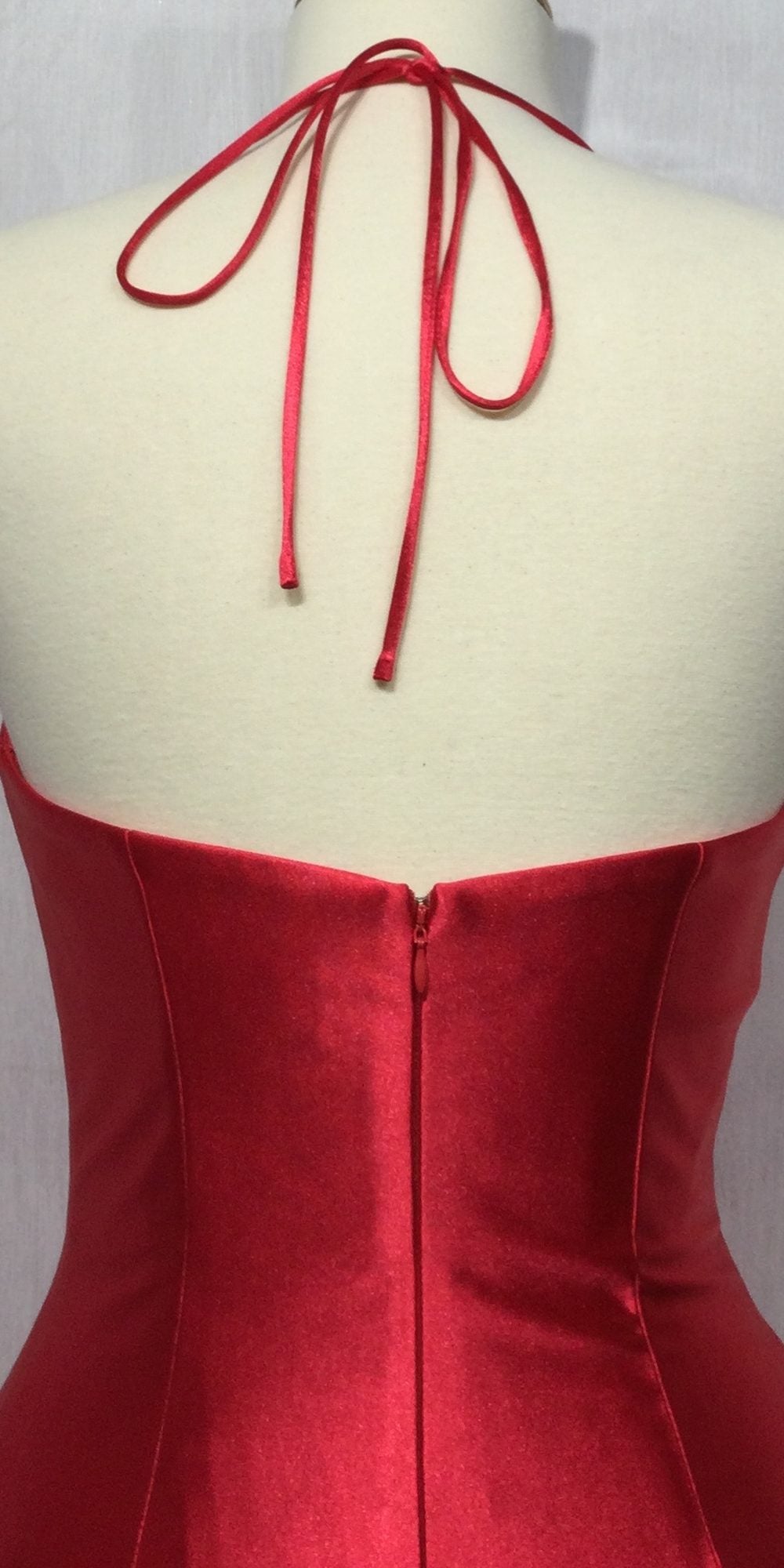 Burgundy satin corset gown bodice back with tie straps and center back seam