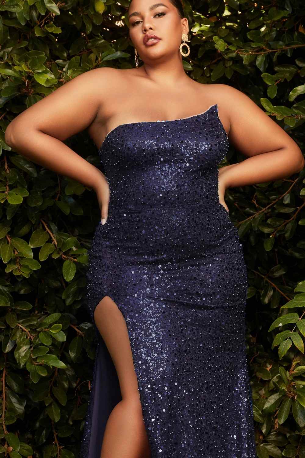 Long strapless fitted sequin gown in deep navy with asymmetrical side slit