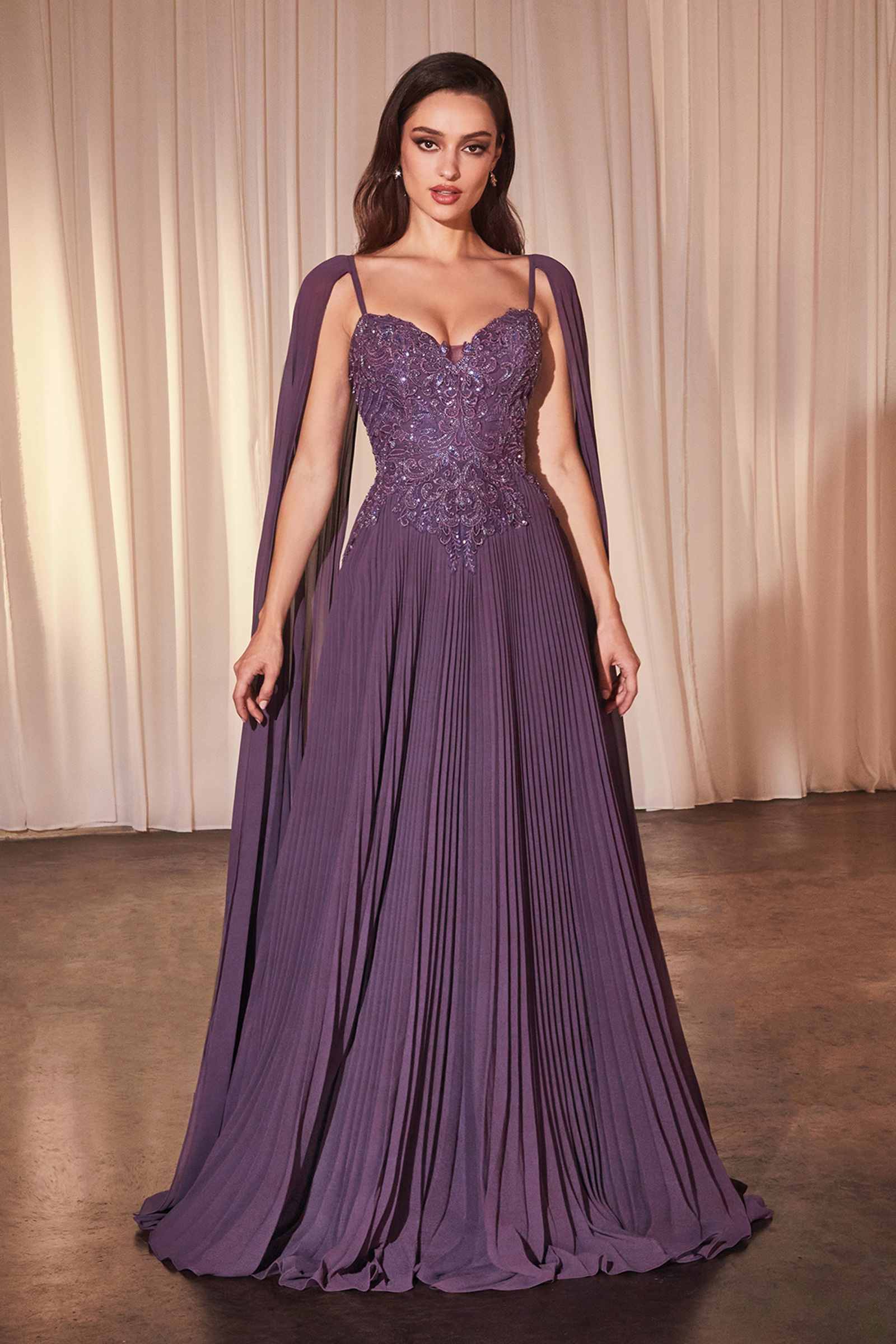 Dusty lavender pleated A-line gown with jeweled sweetheart bodice and cape sleeves