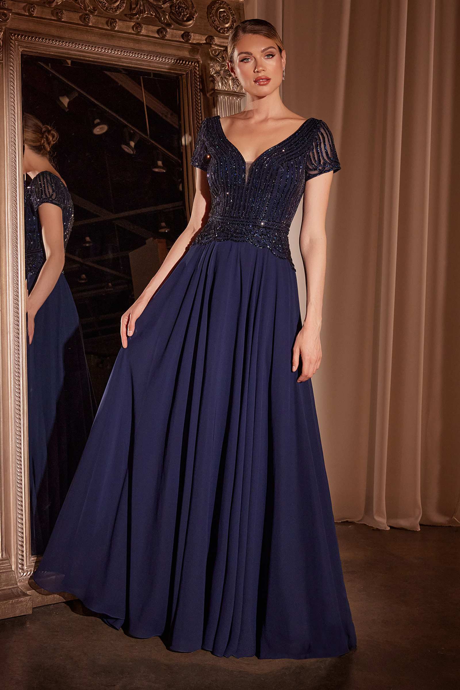 Navy A-line chiffon gown with V-neck beaded bodice and short cap sleeves