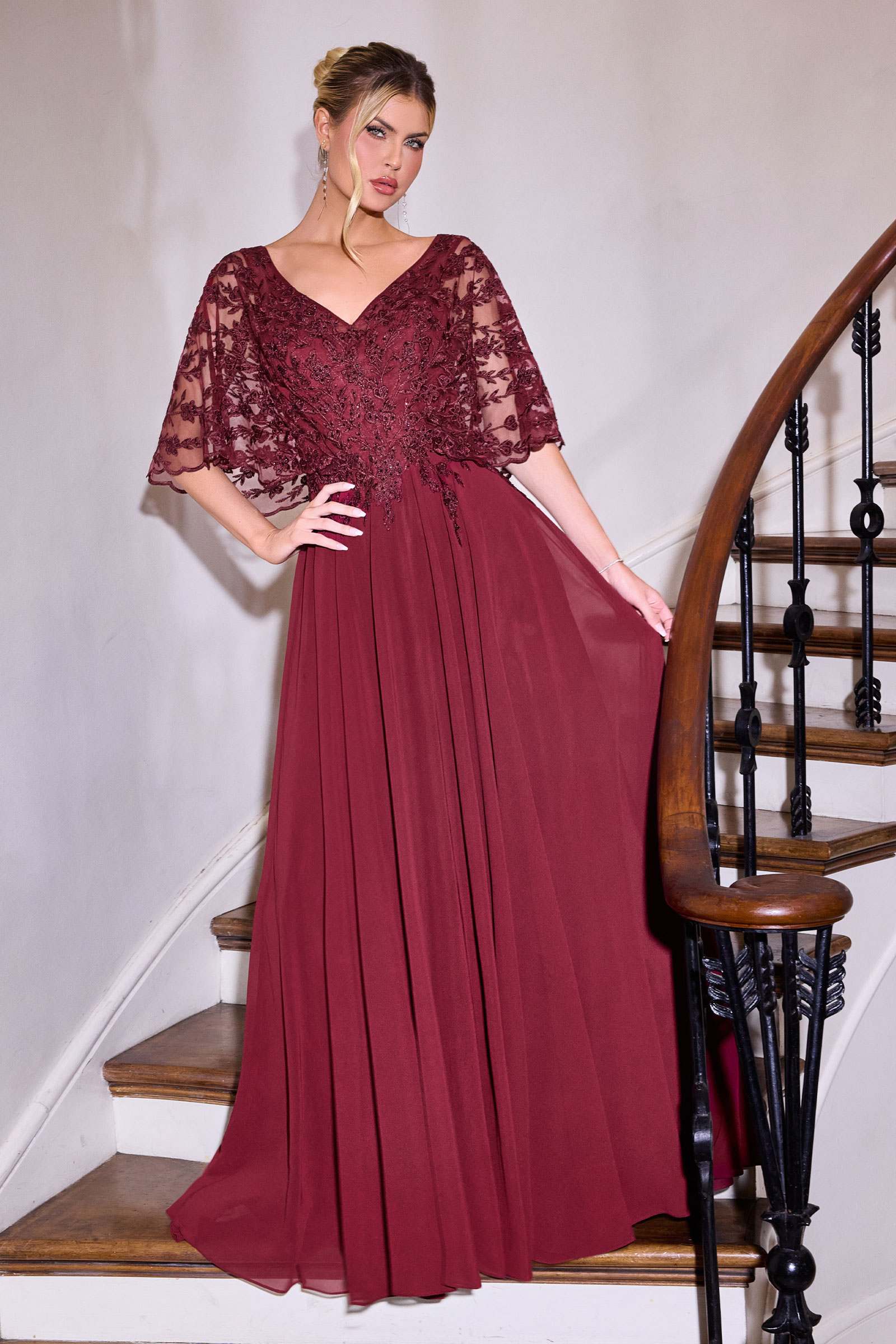 Burgundy V-neck lace bodice A-line gown with sheer embroidered sleeves and pleated skirt