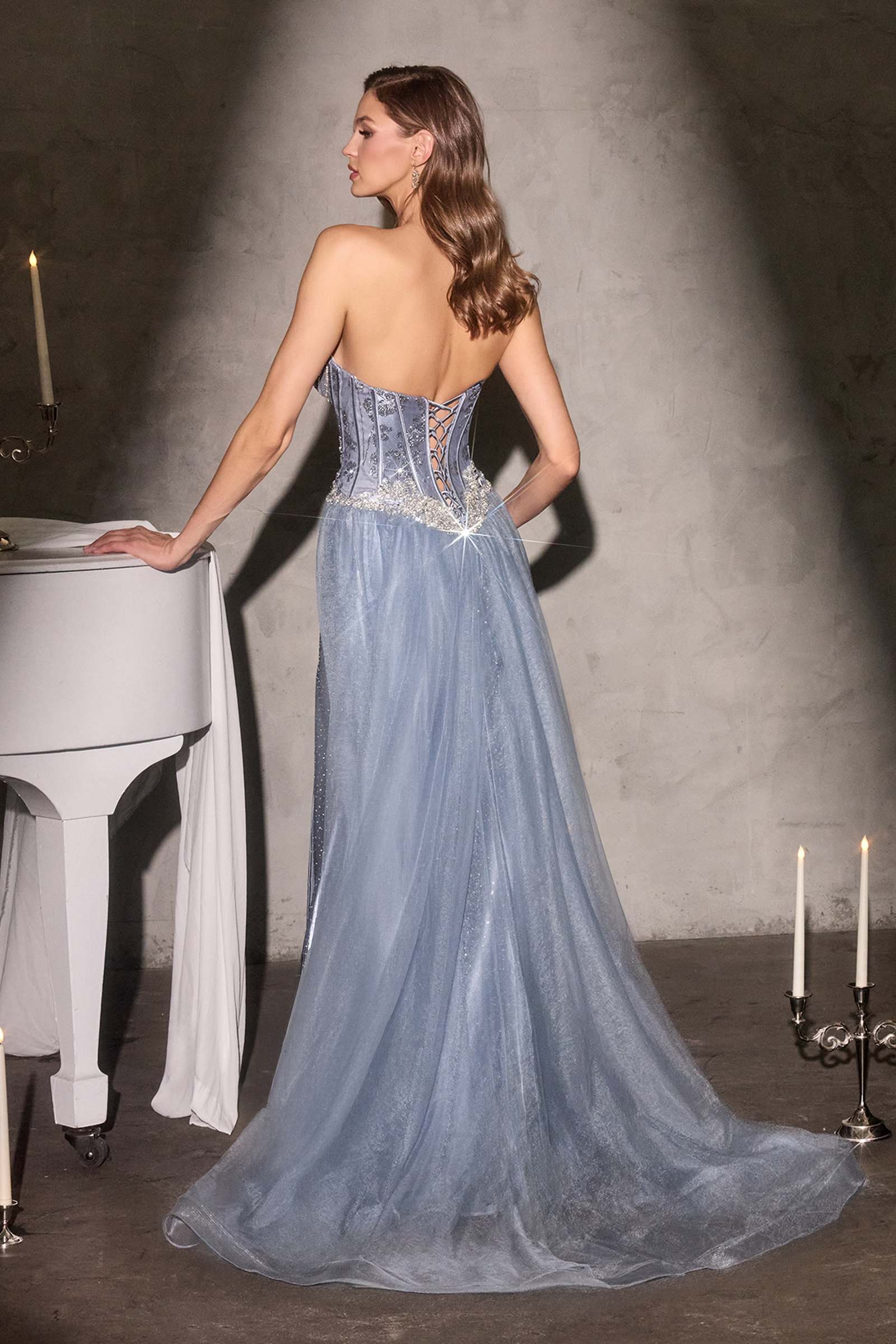 Dusty blue strapless corset gown with sparkling beaded open back and flowing skirt