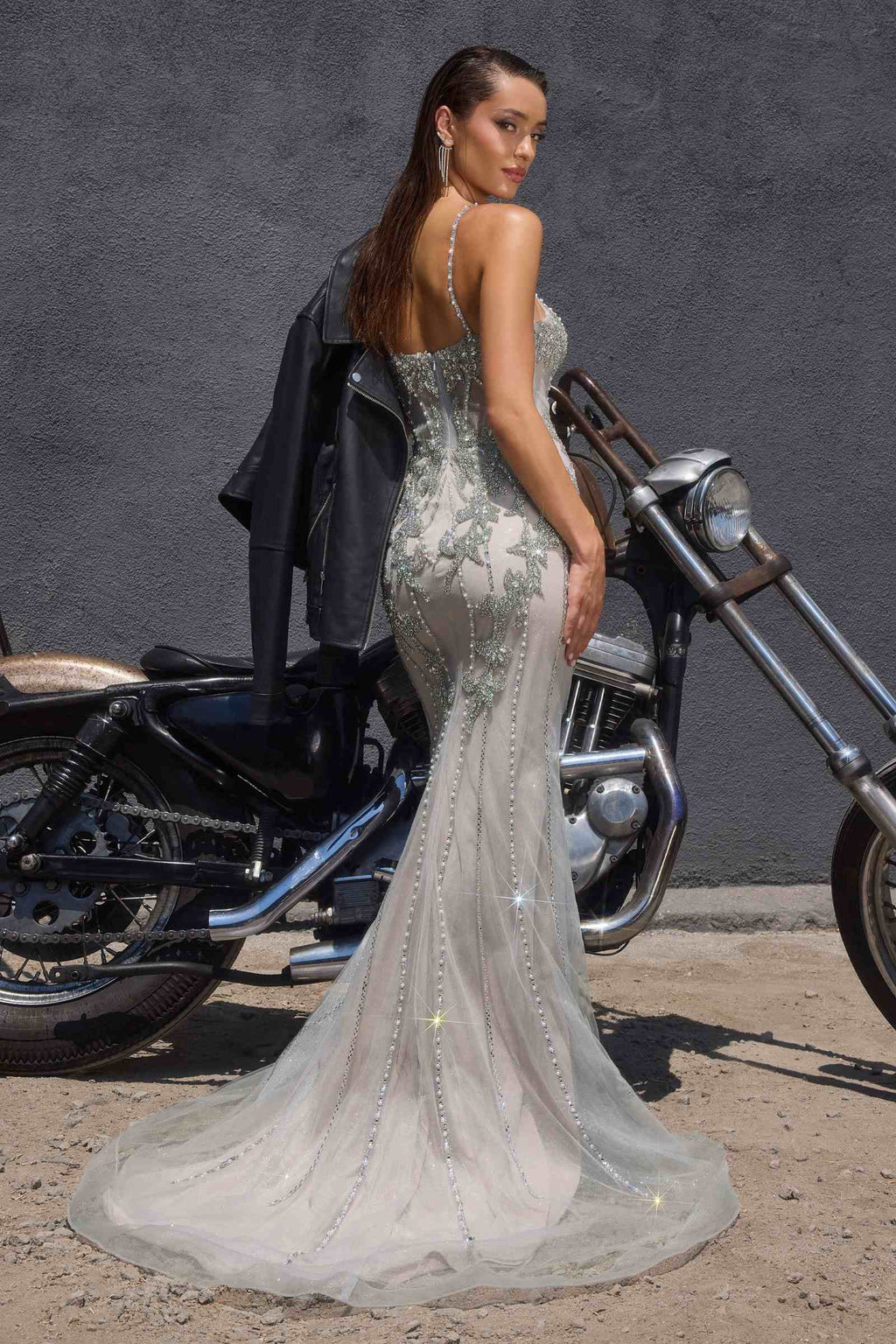 Silver fitted formal dress with V-neck straps and crystal sequin mermaid hem