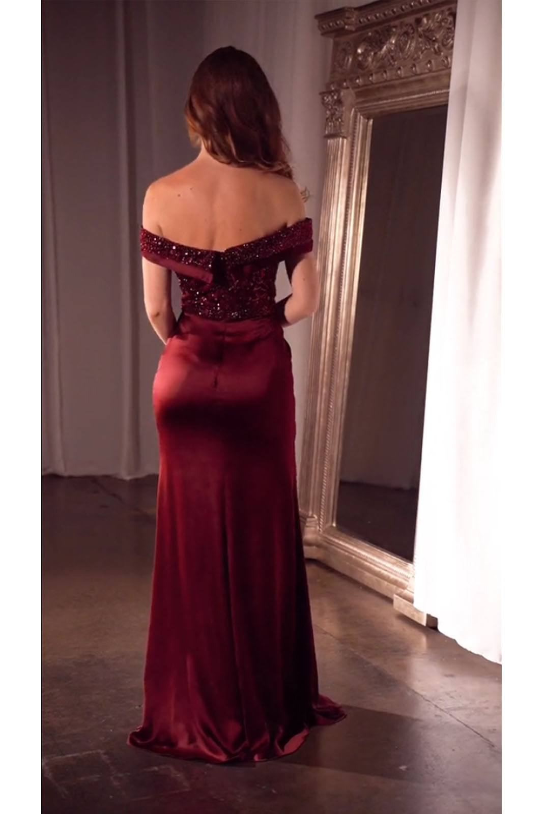 Back view off-shoulder burgundy sequin bodice formal gown with satin drape