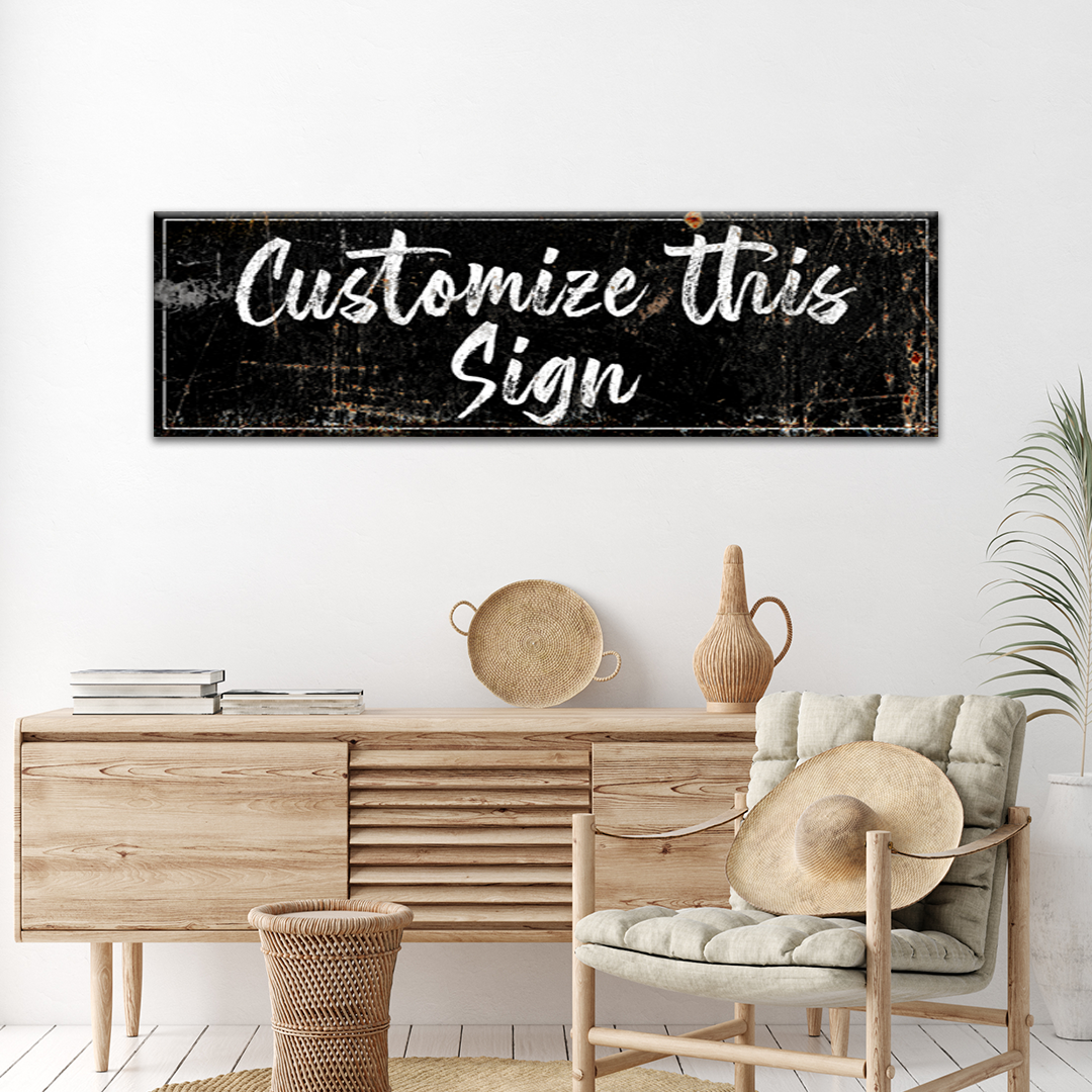 Rustic black canvas wall sign with white “Customize This Sign” text