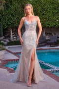 Silver sequin fitted evening gown with sweetheart neckline, thin straps, front leg slit