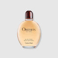 Calvin Klein Obsession for men eau de toilette bottle, amber glass, dark red cap