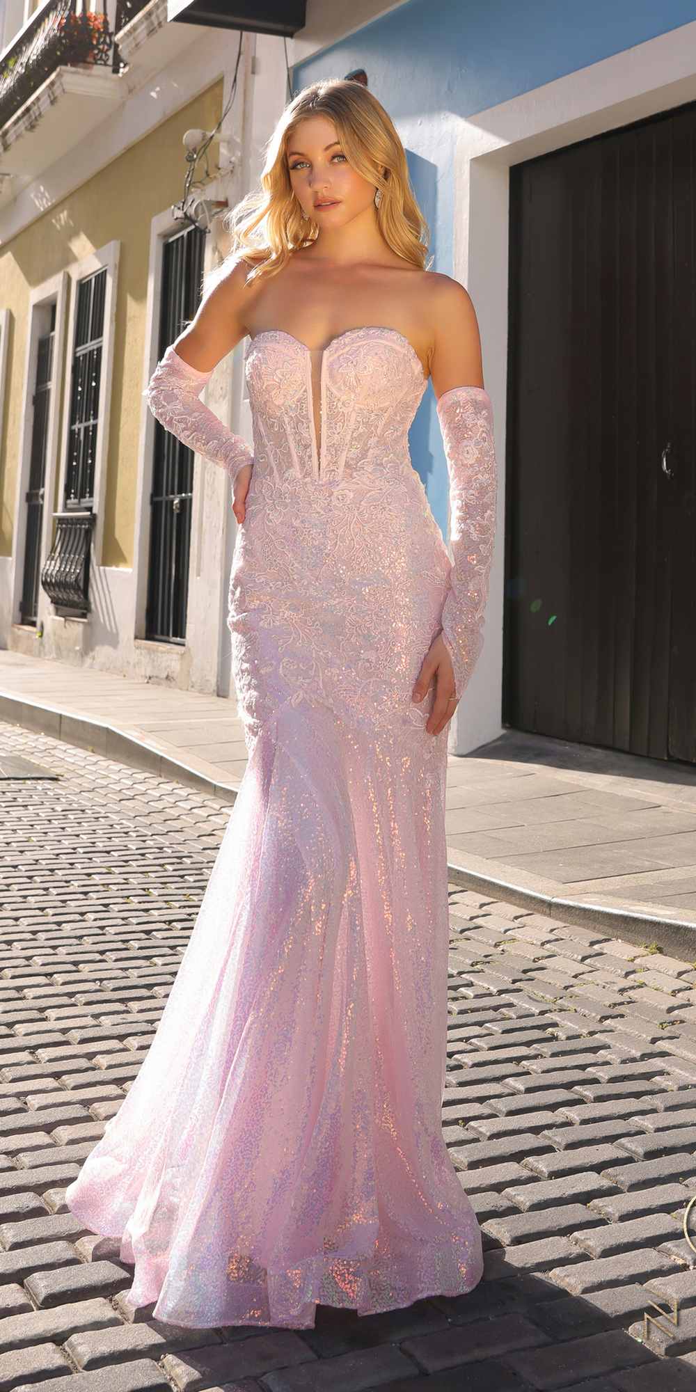 Blush pink strapless sequin mermaid dress with long gloves and fitted corset bodice