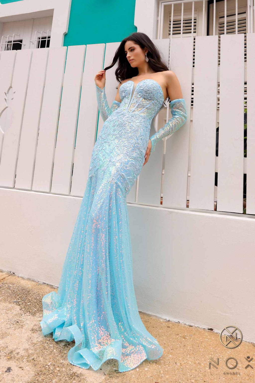Light blue strapless sequin mermaid dress with long gloves, side view of corset bodice