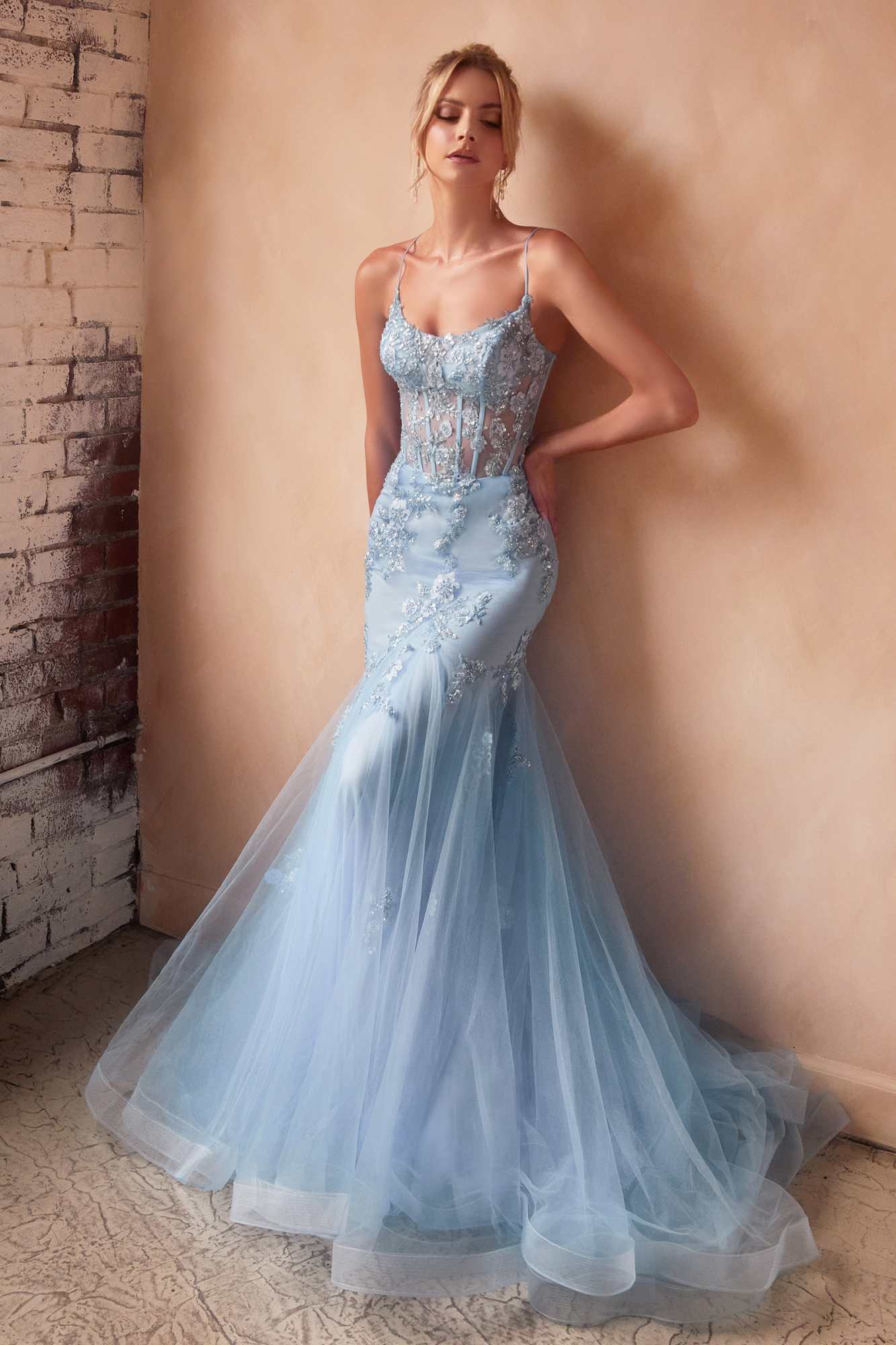 Light blue sparkly mermaid gown with corset bodice and layered tulle skirt, thin straps