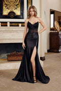 Black strapless prom gown with V neckline, beaded bodice, and side-slit skirt