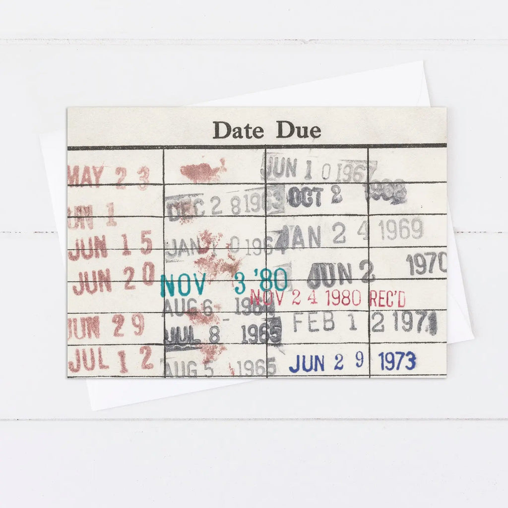 Library due date notecards with 'Date Due' header and red stamped calendar lines