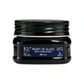 Davines Heart of Glass rich conditioner jar with ribbed black cap and blue front label.
