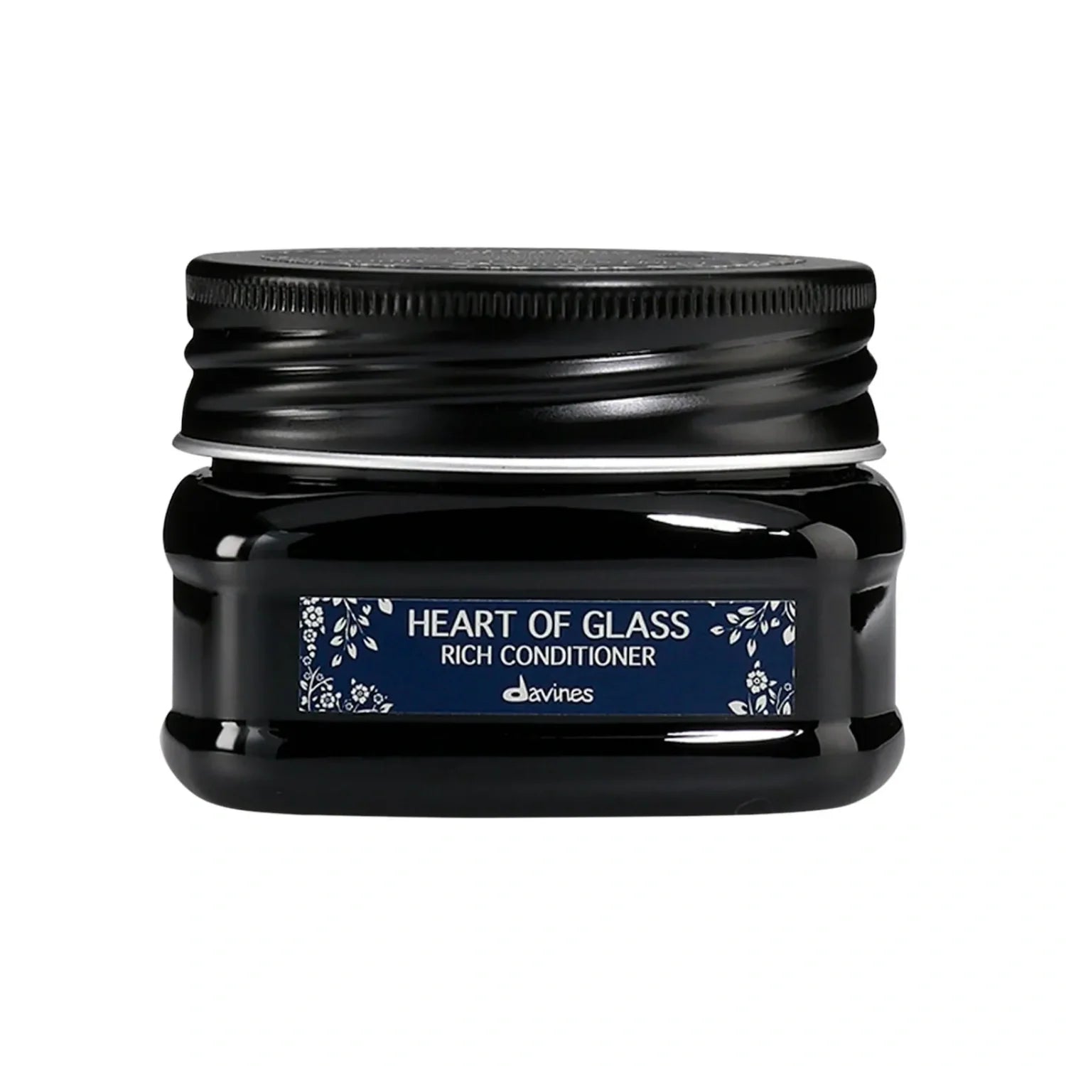 Davines Heart of Glass rich conditioner jar with ribbed black cap and blue front label.